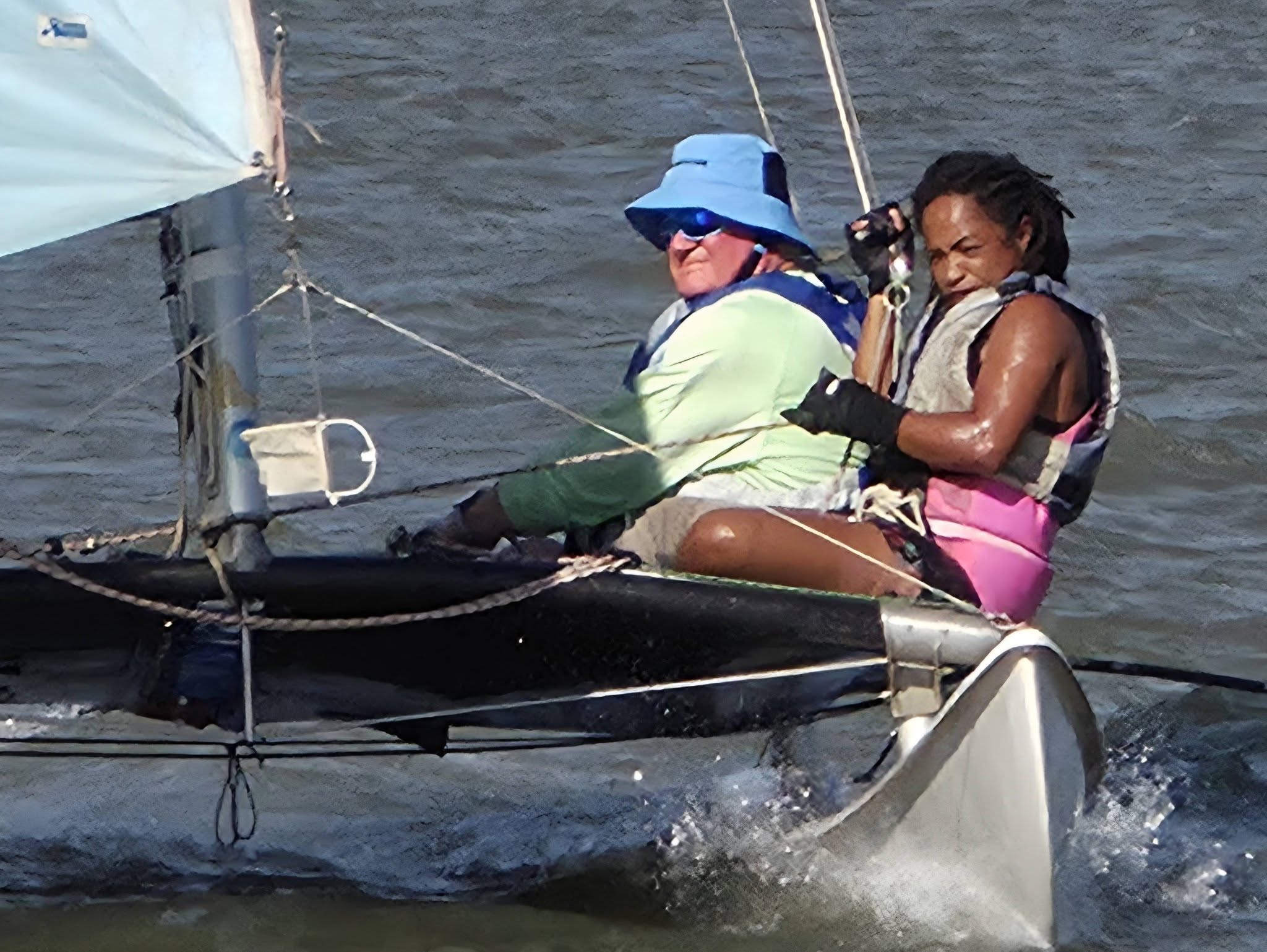 Adults learning to sail a Hobie catamaran at Theewater