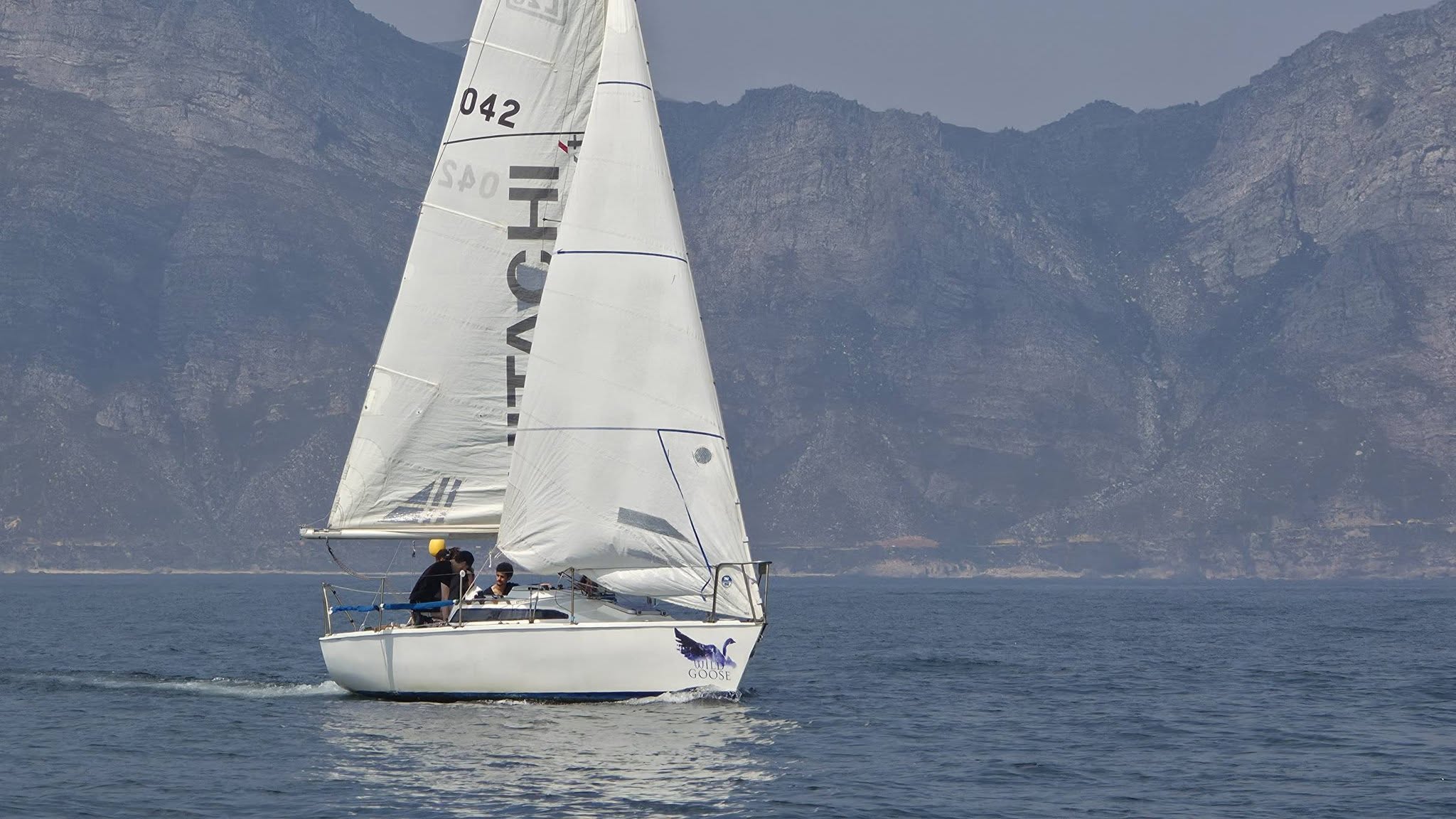 Keelboat sailing in False Bay off Gordons Bay
