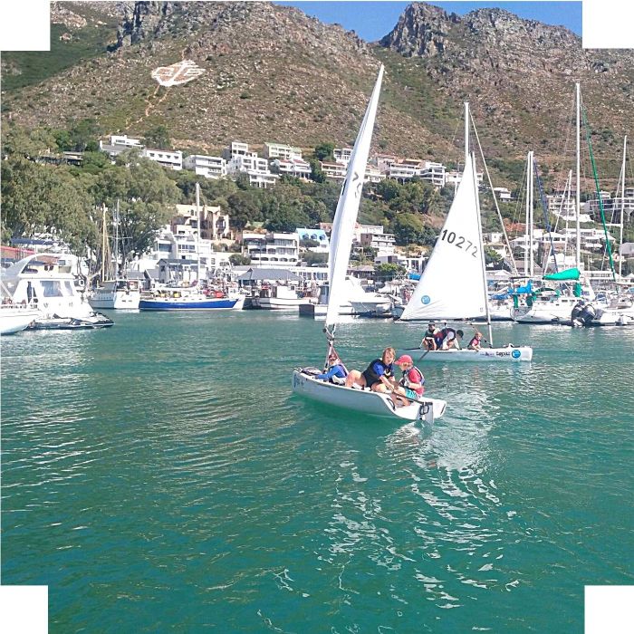 SA Sailing Academy students sailing in Gordon's Bay harbour