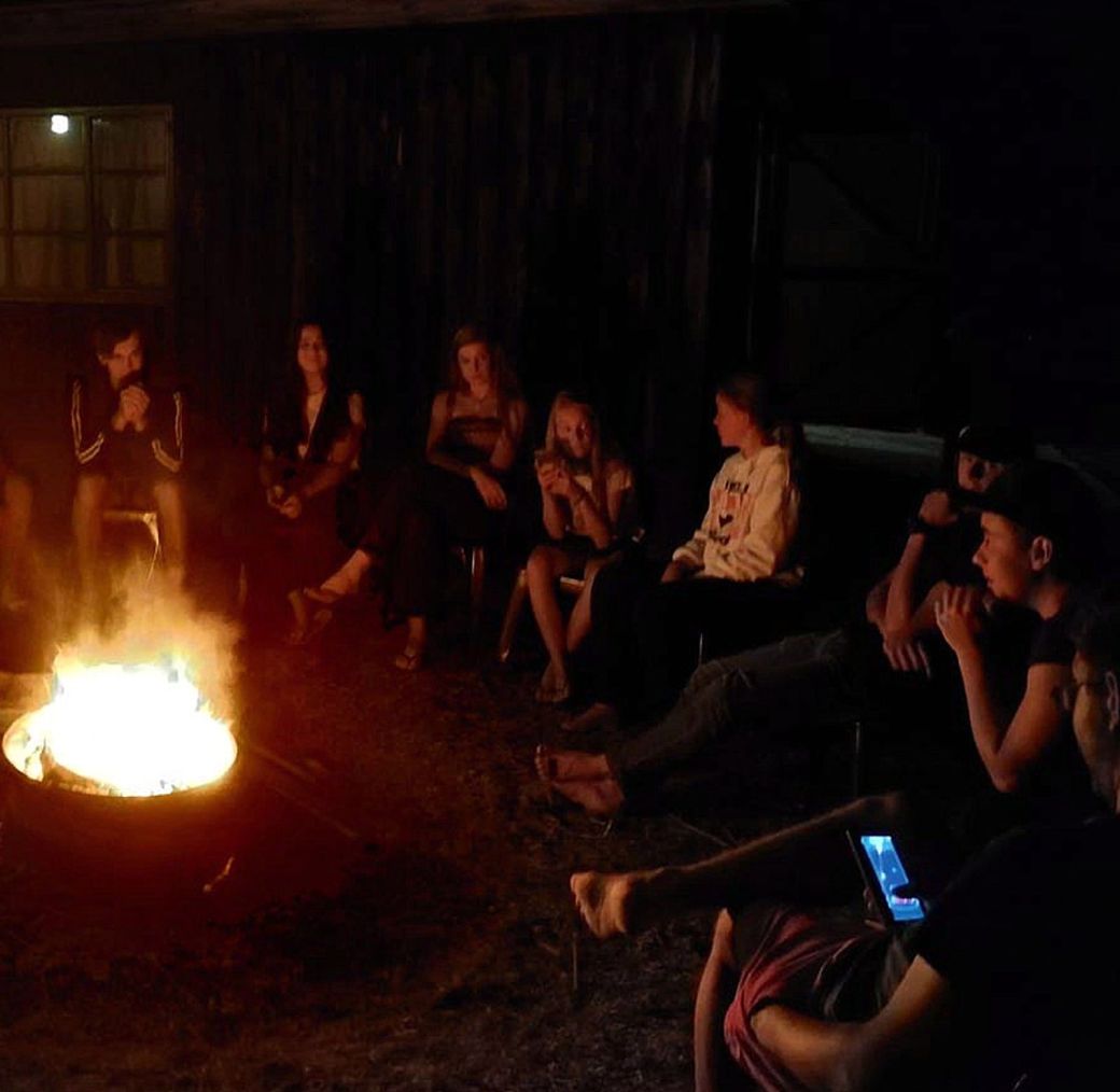 Campfire at a youth sailing camp